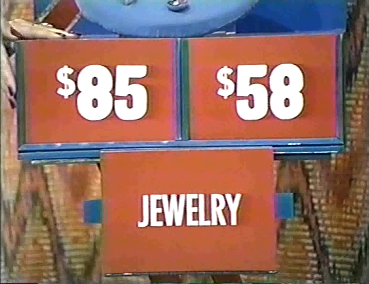 Display of two price options for jewelry, indicating  and  in Super Ball on The Price is Right.