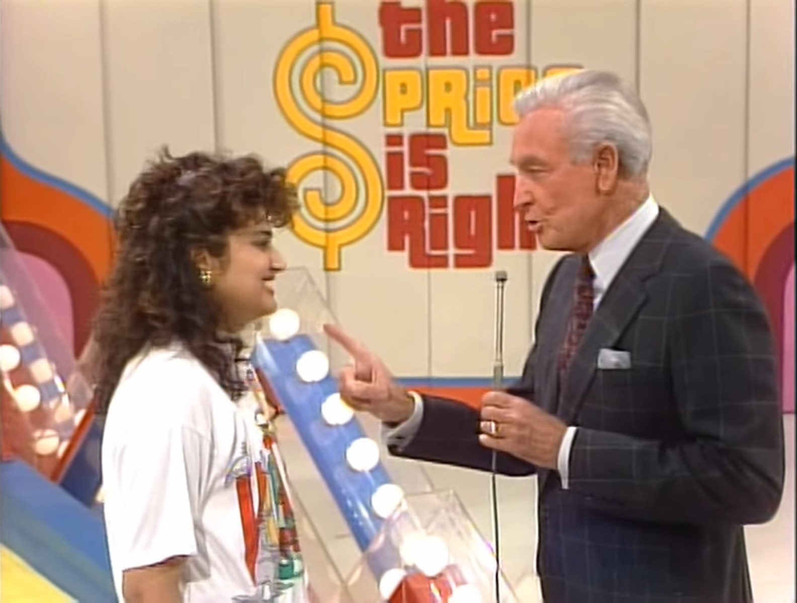 Bob Barker tries in vain to explain to a Price is Right contestant how to play Super Ball.