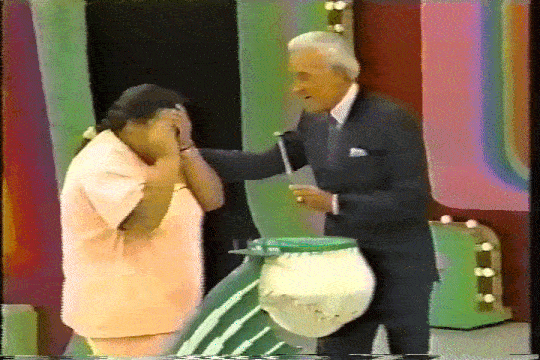 Tony pulls a chip out of the Three Strikes bag, and reacts with excitement at finding out she's won a Porsche on The Price is Right.