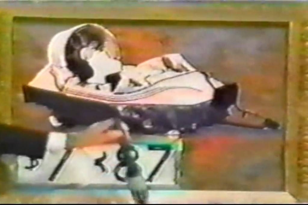 An illustration of a hoverjet in a stylized, cartoonish form, displayed within a decorative frame, while a hand appears to hold a black paintbrush next to it.