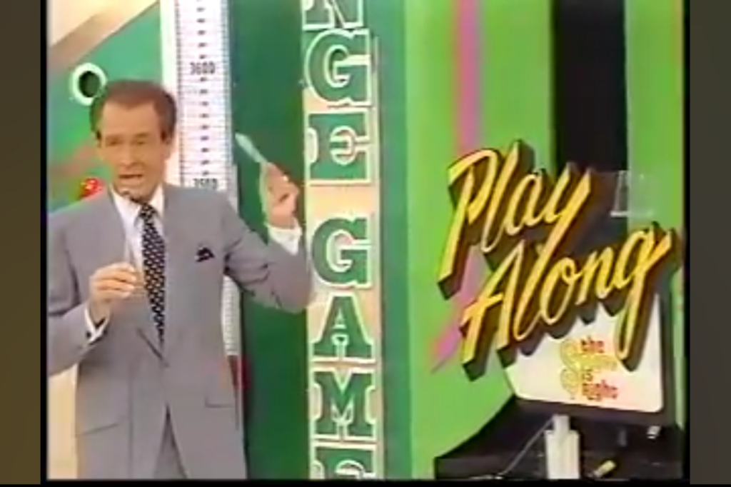A host presenting a segment of 'The Price is Right' featuring the 'Play Along' game, with colorful graphics in the background.