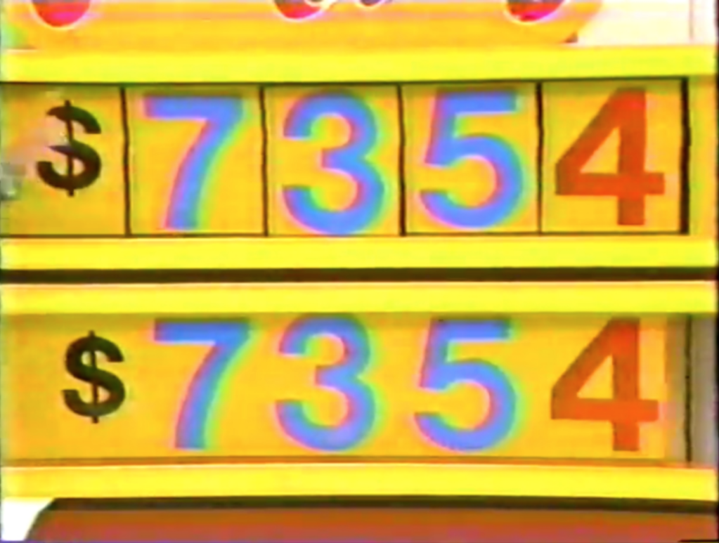 ,354 and ,354 displayed on game boards in The Price is Right pricing game 'One Away'.