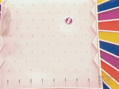 A Plinko chip falls down the board and lands in the center ,000 slot, as Judy celebrates.