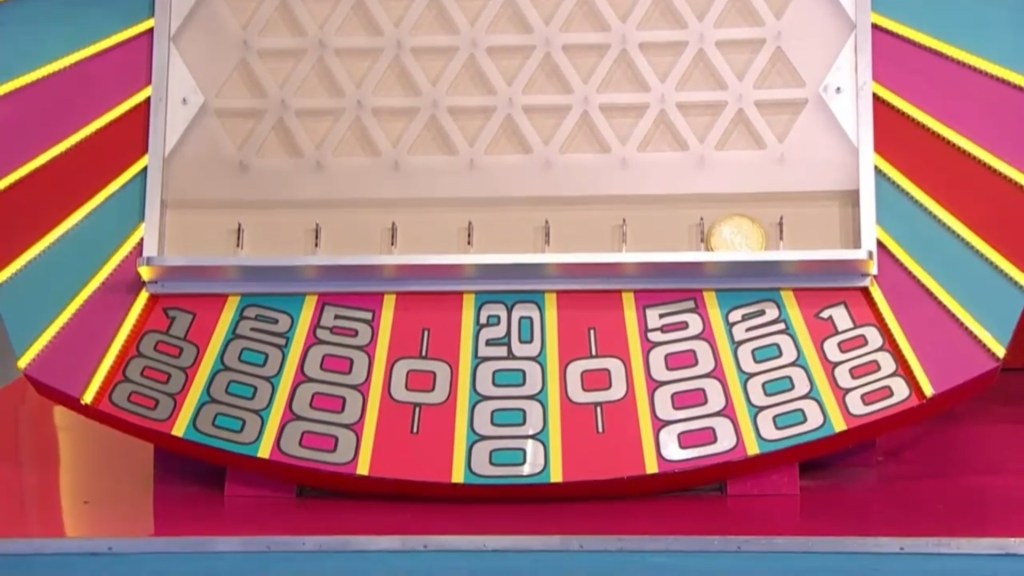 A colorful Plinko board displaying various cash prize slots, including values of 0, ,000, ,000, ,000, and ,000.