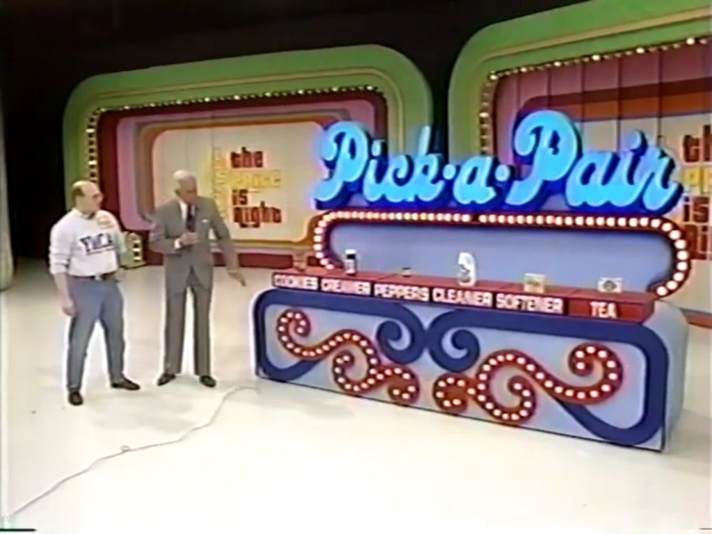 A 1993 episode of The Price is Right showcasing a contestant participating in the 'Pick-a-Pair' segment, with host Bob Barker presenting various products on a brightly lit stage.